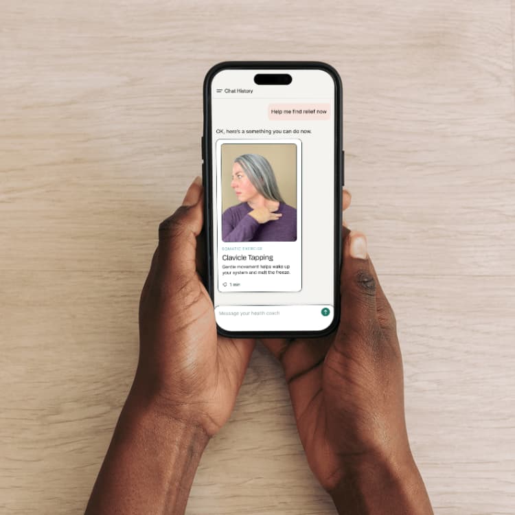 Hands holding a smartphone showing a chat app with a card titled 'Clavicle Tapping'.